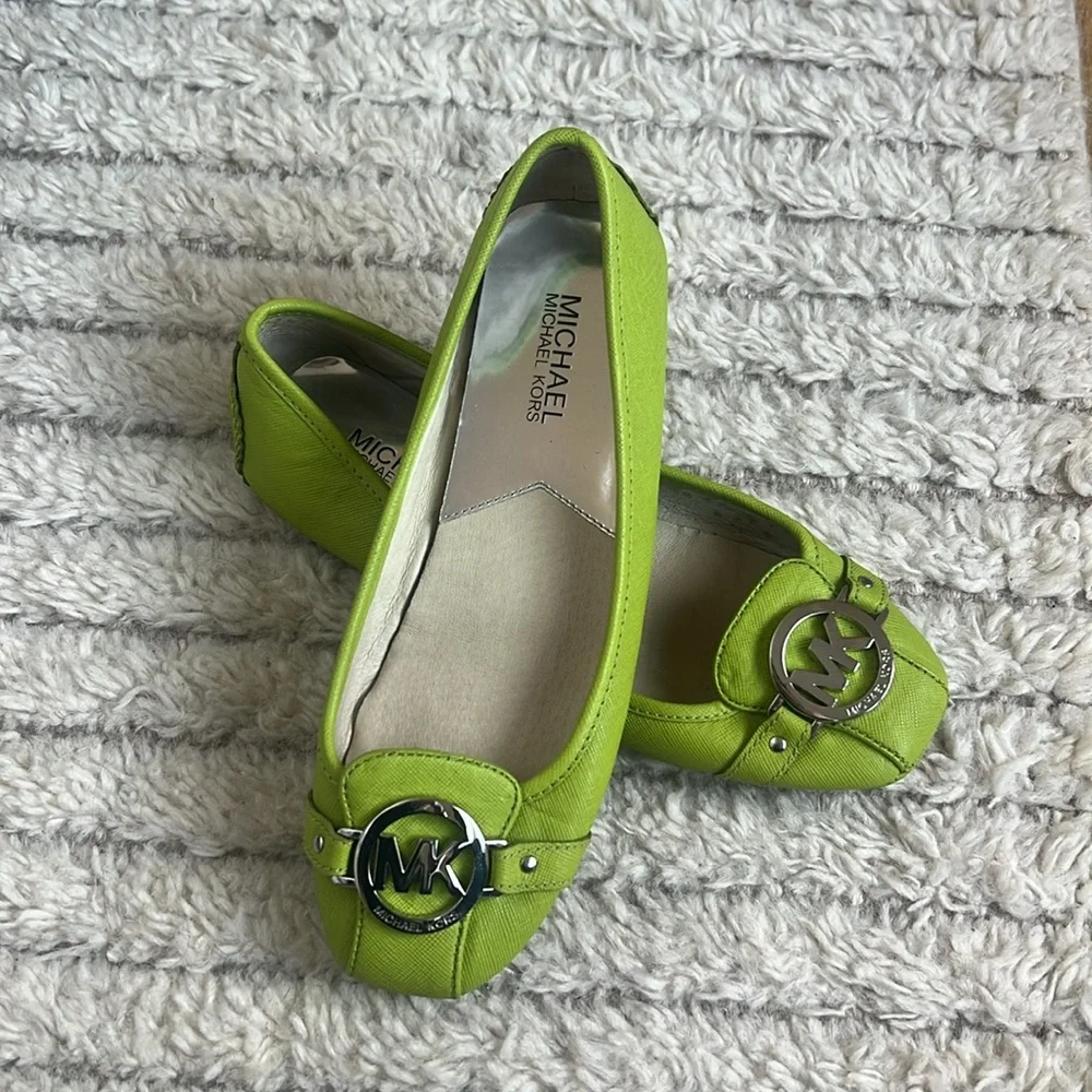 Flat Michael Kors shoes.